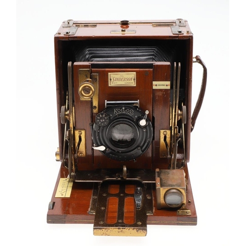 726 - EARLY PLATE CAMERA - 'THE SANDERSON'. A mahogany 'The Sanderson' plate camera with a Koilos lens, in... 