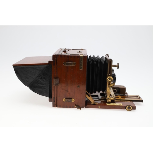 726 - EARLY PLATE CAMERA - 'THE SANDERSON'. A mahogany 'The Sanderson' plate camera with a Koilos lens, in... 