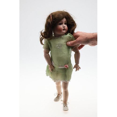 729 - SIMON AND HALBIG FOR KAMMER & REINHARDT - BISQUE HEAD WALKING/TALKING DOLL. A bisque head doll with ... 