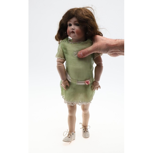 729 - SIMON AND HALBIG FOR KAMMER & REINHARDT - BISQUE HEAD WALKING/TALKING DOLL. A bisque head doll with ... 