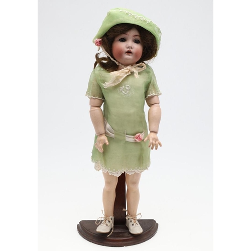 729 - SIMON AND HALBIG FOR KAMMER & REINHARDT - BISQUE HEAD WALKING/TALKING DOLL. A bisque head doll with ... 