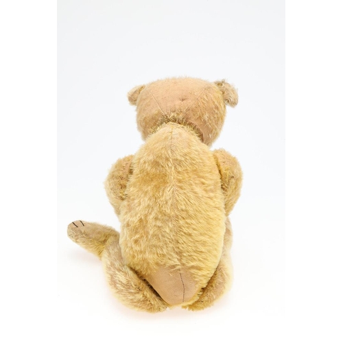 735 - EARLY STEIFF TEDDY BEAR. A large early Steiff Teddy Bear, with elongated limbs, hump back and growle... 