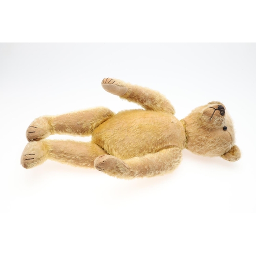 735 - EARLY STEIFF TEDDY BEAR. A large early Steiff Teddy Bear, with elongated limbs, hump back and growle... 