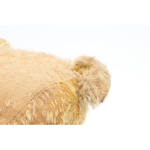 735 - EARLY STEIFF TEDDY BEAR. A large early Steiff Teddy Bear, with elongated limbs, hump back and growle... 