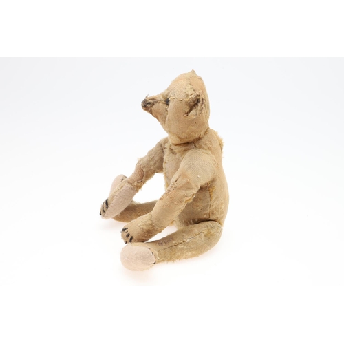 736 - EARLY STEIFF TEDDY BEAR. A small early 20thc Steiff Teddy Bear with elongated limbs, hump back and b... 