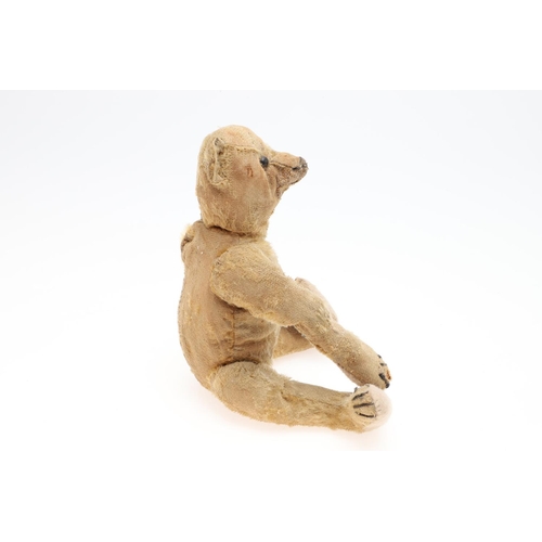 736 - EARLY STEIFF TEDDY BEAR. A small early 20thc Steiff Teddy Bear with elongated limbs, hump back and b... 