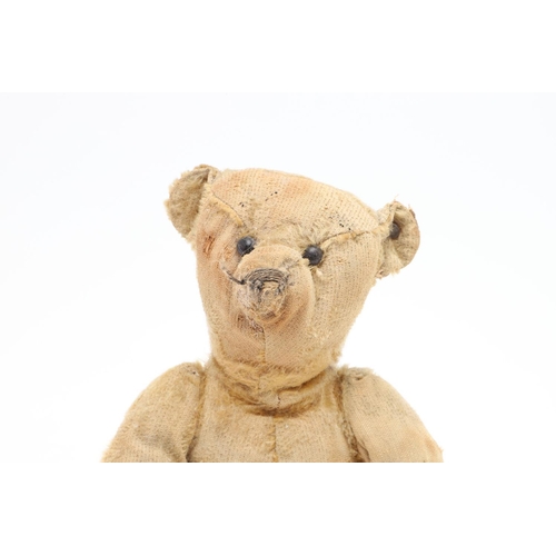 736 - EARLY STEIFF TEDDY BEAR. A small early 20thc Steiff Teddy Bear with elongated limbs, hump back and b... 