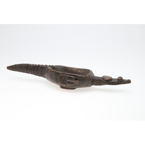 740 - TRIBAL - PAPUA NEW GUINEA SEPIK BOWL, CROCODILE. A carved wooden bowl with Crocodile shaped head and... 