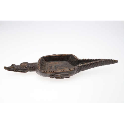 740 - TRIBAL - PAPUA NEW GUINEA SEPIK BOWL, CROCODILE. A carved wooden bowl with Crocodile shaped head and... 