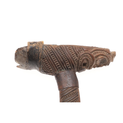 751 - TRIBAL INTEREST - MAORI CEREMONIAL ADZE OR TOKI. Probably 19thc, with a greenstone adze blade bound ... 