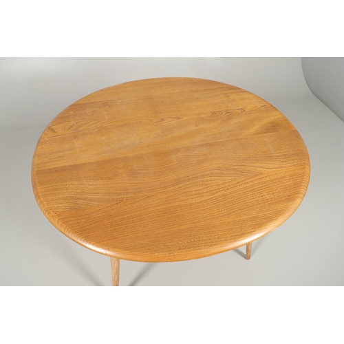 769 - VINTAGE ERCOL BREAKFAST TABLE & FOUR CHAIRS. A light elm and beech circular breakfast table with spi... 