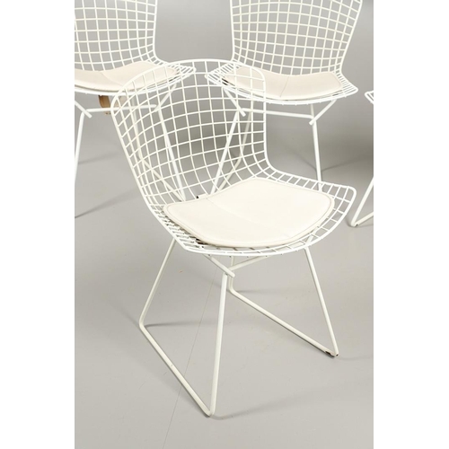 778 - HARRY BERTOIA - SET OF FOUR DESIGNER WIRE WORK CHAIRS. A set of four mid 20thc wire work chairs with... 