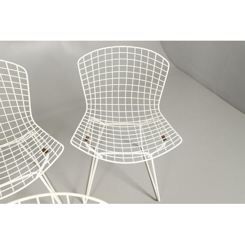 778 - HARRY BERTOIA - SET OF FOUR DESIGNER WIRE WORK CHAIRS. A set of four mid 20thc wire work chairs with... 