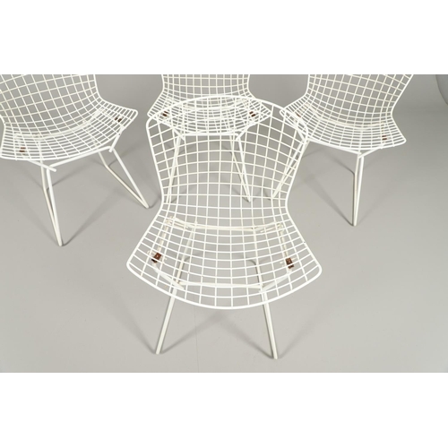 778 - HARRY BERTOIA - SET OF FOUR DESIGNER WIRE WORK CHAIRS. A set of four mid 20thc wire work chairs with... 