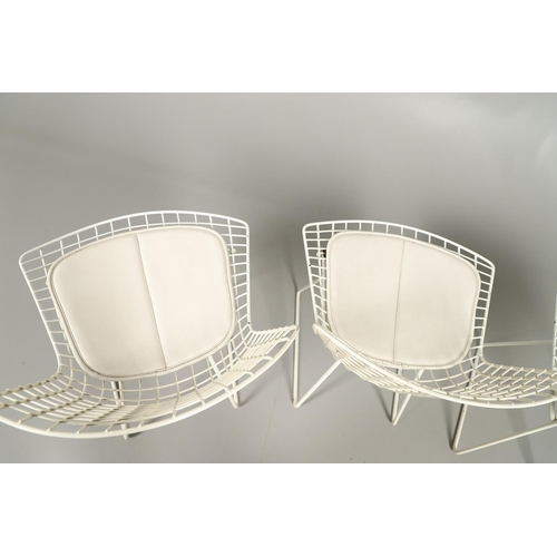 778 - HARRY BERTOIA - SET OF FOUR DESIGNER WIRE WORK CHAIRS. A set of four mid 20thc wire work chairs with... 