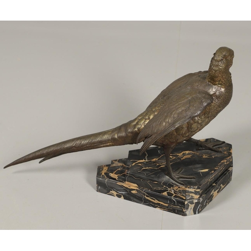 799 - LARGE BRONZE SCULPTURE OF A PHEASANT. In the style of Jules Moigniez, the large figure of a pheasant... 