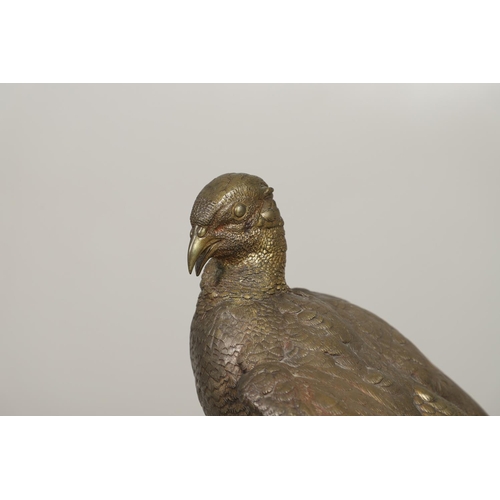 799 - LARGE BRONZE SCULPTURE OF A PHEASANT. In the style of Jules Moigniez, the large figure of a pheasant... 