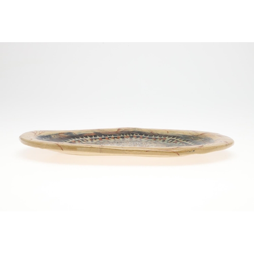 806 - ATTRIBUTED TO SIR GRAYSON PERRY (B 1960) - POTTERY DISH, 1988. An oval pottery dish, incised to the ... 