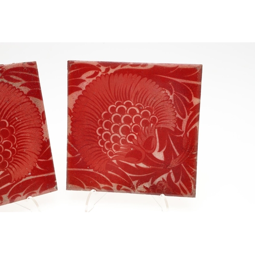 810 - WILLIAM DE MORGAN TILES. Two Merton Abbey period ruby lustre tiles in a version of the BBB design, w... 