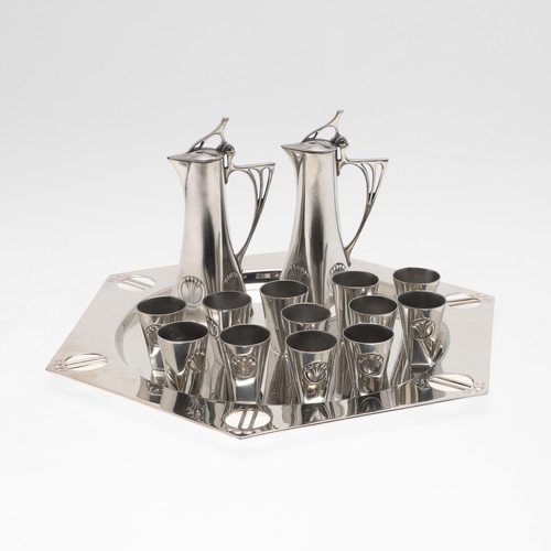 826 - WMF LIQUEUR SET & TRAY. Circa 1900 with a hexagonal shaped tray with a stylised pierced rim, with tw... 