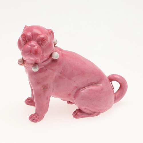 839 - PORCELAIN MODELS OF PUG DOGS. Including a pair of yellow glazed porcelain models of standing Pug dog... 