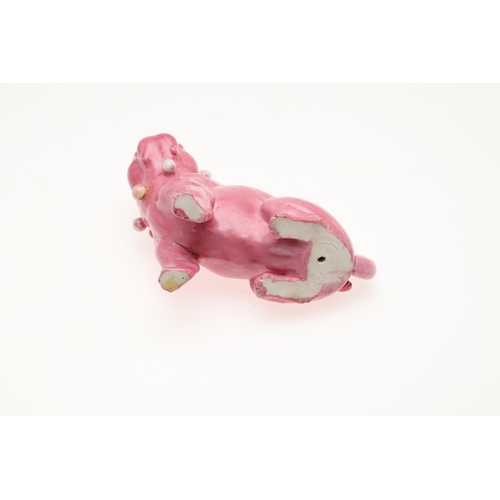 839 - PORCELAIN MODELS OF PUG DOGS. Including a pair of yellow glazed porcelain models of standing Pug dog... 