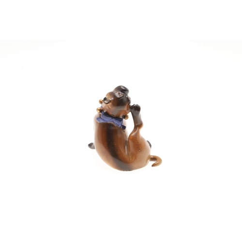 841 - MEISSEN PORCELAIN PUG DOGS. A porcelain model of a seated Pug dog with bell collar, incised number '... 