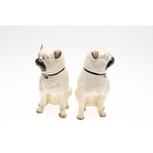 842 - TWO PAIRS OF POTTERY PUG DOGS & WINSTANLEY PUG. Two pairs of seated pottery Pug Dogs, each painted w... 