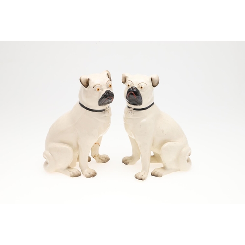 842 - TWO PAIRS OF POTTERY PUG DOGS & WINSTANLEY PUG. Two pairs of seated pottery Pug Dogs, each painted w... 