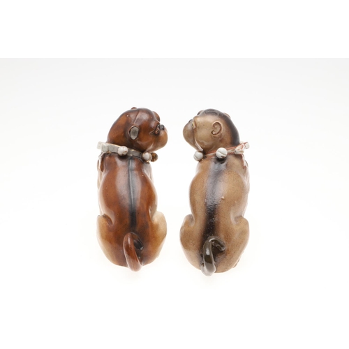 843 - PORCELAIN MODELS OF PUG DOGS. Including a Meissen style porcelain model of a seated Pug (17.5cms hig... 