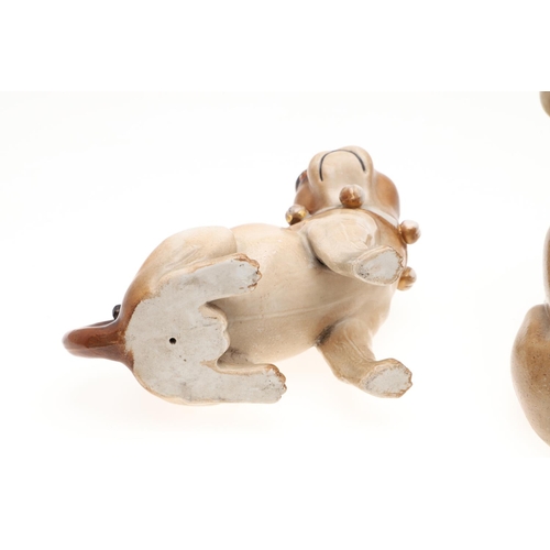 843 - PORCELAIN MODELS OF PUG DOGS. Including a Meissen style porcelain model of a seated Pug (17.5cms hig... 