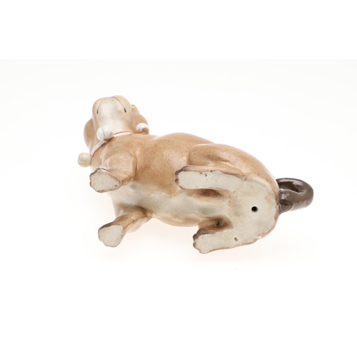 843 - PORCELAIN MODELS OF PUG DOGS. Including a Meissen style porcelain model of a seated Pug (17.5cms hig... 