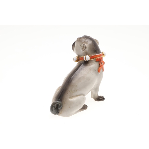 843 - PORCELAIN MODELS OF PUG DOGS. Including a Meissen style porcelain model of a seated Pug (17.5cms hig... 