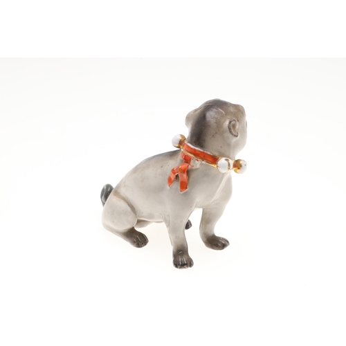 843 - PORCELAIN MODELS OF PUG DOGS. Including a Meissen style porcelain model of a seated Pug (17.5cms hig... 