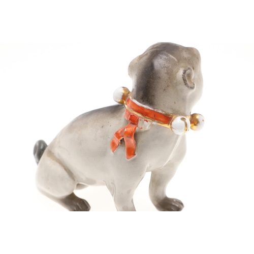 843 - PORCELAIN MODELS OF PUG DOGS. Including a Meissen style porcelain model of a seated Pug (17.5cms hig... 