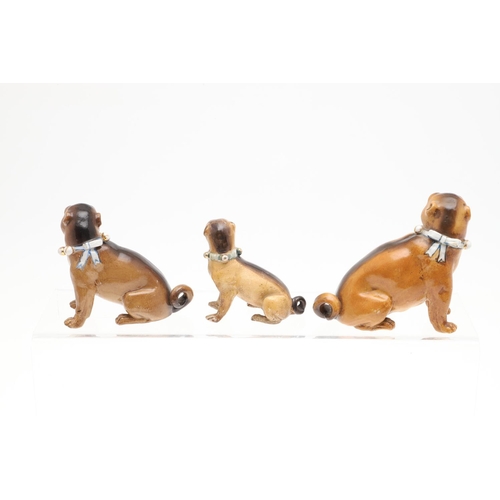 845 - PORCELAIN MODELS OF PUG DOGS. A mixed group of six various porcelain Pug Dogs, the largest standing ... 