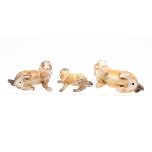 845 - PORCELAIN MODELS OF PUG DOGS. A mixed group of six various porcelain Pug Dogs, the largest standing ... 