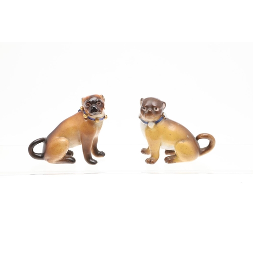 845 - PORCELAIN MODELS OF PUG DOGS. A mixed group of six various porcelain Pug Dogs, the largest standing ... 