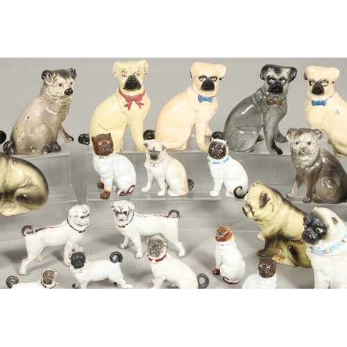 847 - COLLECTION OF PORCELAIN & POTTERY PUGS INCLUDING LIDDED JAR. A mixed lot including a porcelain lidde... 