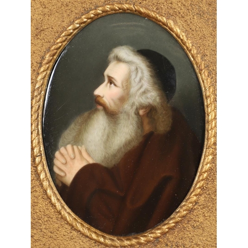 849 - CONTINENTAL FRAMED PORCELAIN PLAQUE. Possibly by KPM Berlin, the oval plaque painted with a religiou... 