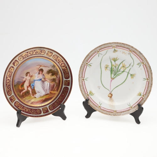 857 - ROYAL COPENHAGEN FLORA DANICA PLATE & ROYAL VIENNA STYLE CABINET PLATE. A Flora Danica plate painted... 