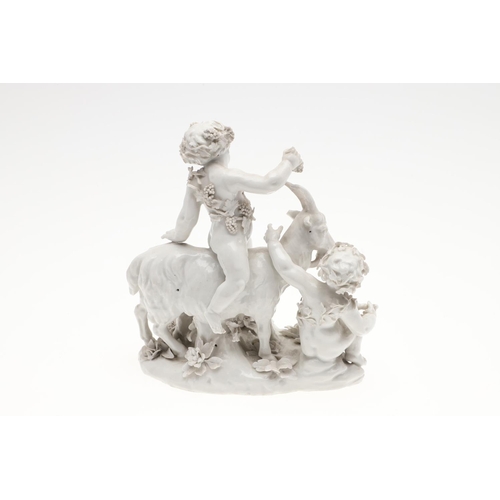 861 - PAIR OF VIENNA STYLE PORCELAIN FIGURE GROUPS. A pair of blanc de chine figure groups, with cherub fi... 