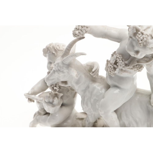 861 - PAIR OF VIENNA STYLE PORCELAIN FIGURE GROUPS. A pair of blanc de chine figure groups, with cherub fi... 