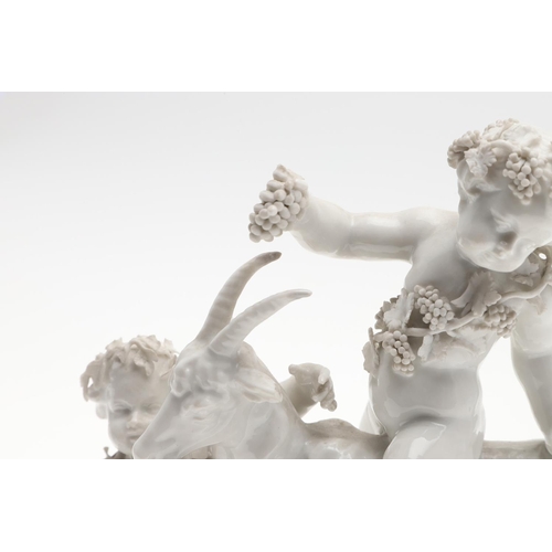 861 - PAIR OF VIENNA STYLE PORCELAIN FIGURE GROUPS. A pair of blanc de chine figure groups, with cherub fi... 