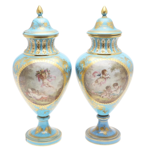 864 - LARGE PAIR OF SEVRES STYLE LIDDED VASES. A large pair of 19thc Sevres style lidded vases, with a pan... 