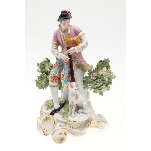 869 - LARGE PAIR OF CHELSEA STYLE PORCELAIN FIGURES. A pair of continental figures of a lady and gent play... 