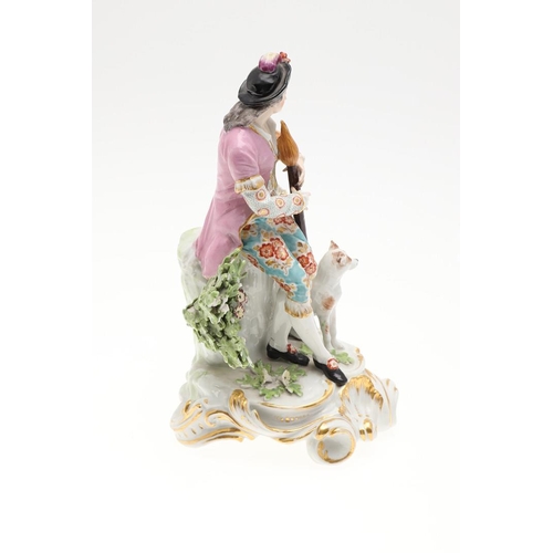 869 - LARGE PAIR OF CHELSEA STYLE PORCELAIN FIGURES. A pair of continental figures of a lady and gent play... 