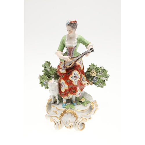 869 - LARGE PAIR OF CHELSEA STYLE PORCELAIN FIGURES. A pair of continental figures of a lady and gent play... 