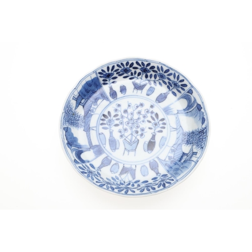 878 - TWO CHINESE SMALL BLUE & WHITE DISHES. Late 19thc in the Kangxi style, one dish painted to the centr... 