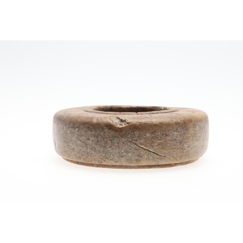 879 - CHINESE SOAPSTONE BRUSH WASHER. Possibly Ming dynasty, of shallow circular form with a raised rim an... 